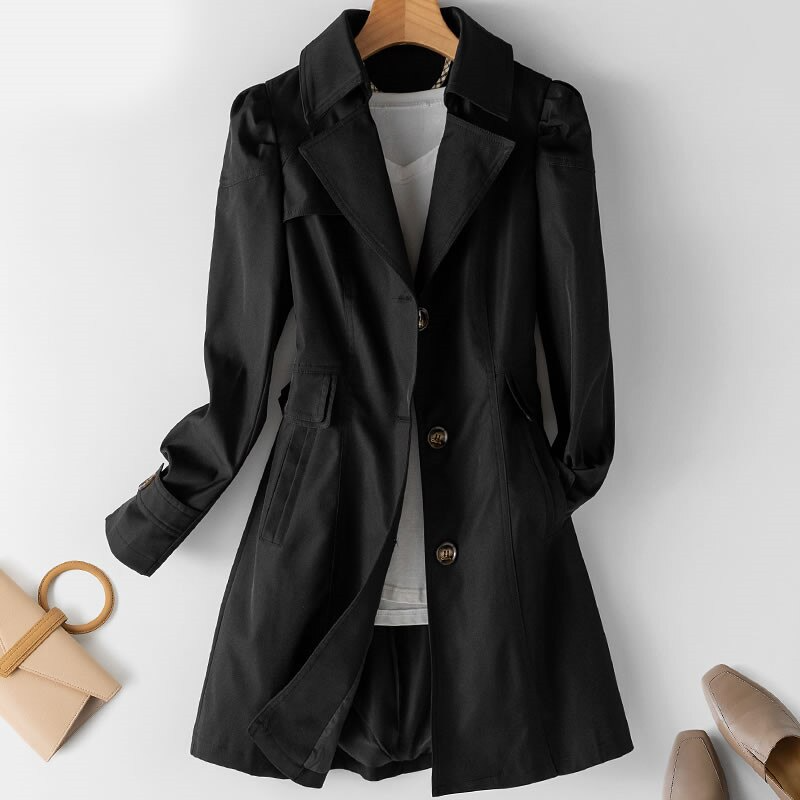 Trendy trenchcoat voor dames - ideaal voor een moderne en stijlvolle look tijdens het herfstseizoen. Gemaakt van hoogwaardige stof voor duurzaamheid en comfort, met praktische zakken en verfijnde details.