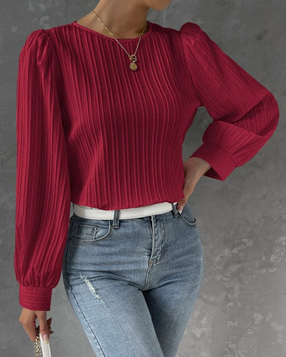 Deze stijlvolle blouse is voorzien van lantaarnmouwen voor een trendy uitstraling. Gemaakt van een katoenmix, spandex en polyester, is deze blouse geschikt voor diverse gelegenheden en biedt het een comfortabele pasvorm.