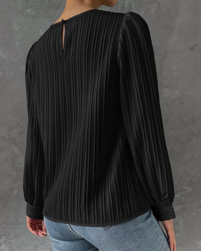 Deze stijlvolle blouse is voorzien van lantaarnmouwen voor een trendy uitstraling. Gemaakt van een katoenmix, spandex en polyester, is deze blouse geschikt voor diverse gelegenheden en biedt het een comfortabele pasvorm.