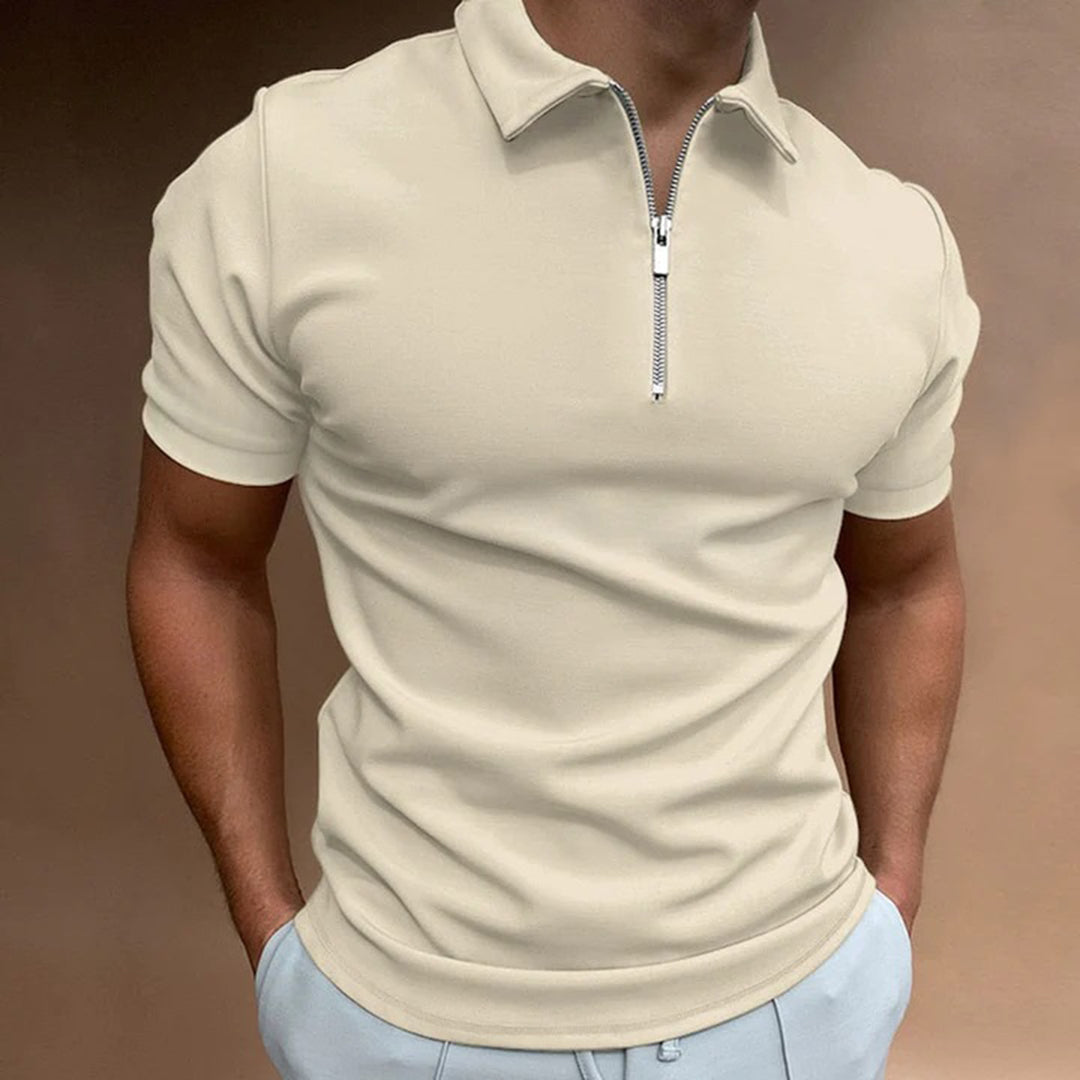 Stijlvolle poloshirt met rits, gemaakt van hoogwaardig polyester en voorzien van een modern ontwerp. Perfect voor een slanke en moderne uitstraling, met klassieke kraag en effen kleur voor tijdloze verfijning. Geschikt voor diverse gelegenheden.