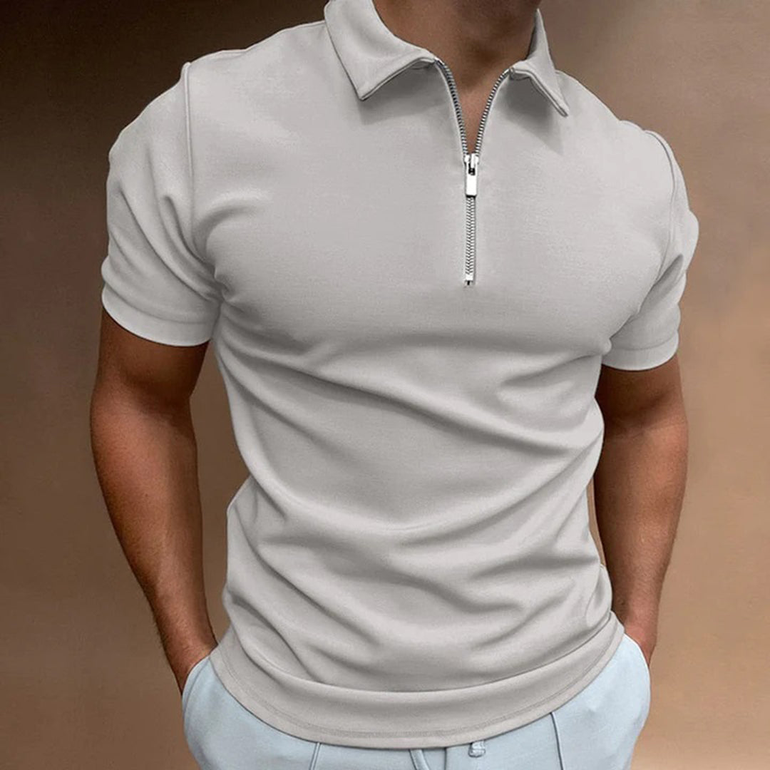 Stijlvolle poloshirt met rits, gemaakt van hoogwaardig polyester en voorzien van een modern ontwerp. Perfect voor een slanke en moderne uitstraling, met klassieke kraag en effen kleur voor tijdloze verfijning. Geschikt voor diverse gelegenheden.