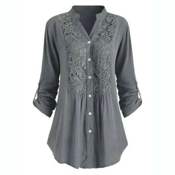 Lange blouse met trendy pofmouwen, gemaakt van comfortabele materialen met een flatterende pasvorm. Dit veelzijdige ontwerp kan zowel formeel als casual gedragen worden, en voegt een vleugje eigentijdse elegantie toe aan elke outfit.