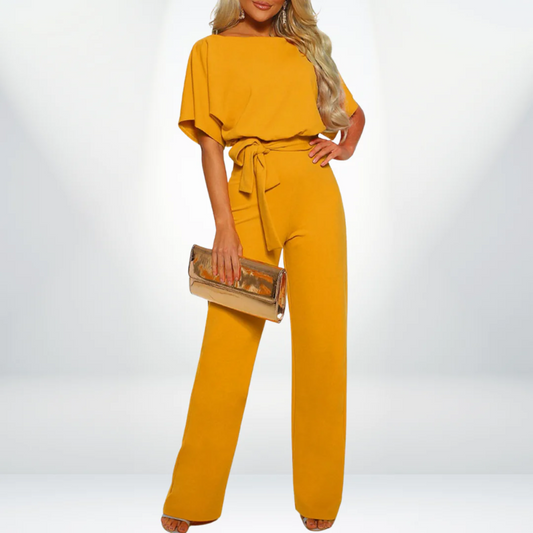 Deze veelzijdige dames jumpsuit combineert een elegante uitstraling met comfort, dankzij het high waist design en korte mouwen. Verkrijgbaar in prachtige kleuren zoals geel, blauw en licht bruin, is deze jumpsuit ideaal voor diverse gelegenheden.