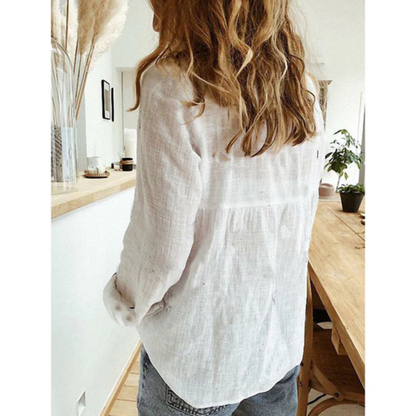 Deze linnen damesblouse is gemaakt van ademend materiaal voor ultiem draagcomfort, heeft een veelzijdig design en een losse pasvorm voor een casual en elegante uitstraling. Perfect voor een trendy en zomerse look, geschikt voor diverse gelegenheden en eenvoudig te combineren. Maattabel beschikbaar voor verschillende maten.