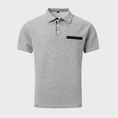 Heren poloshirt dat comfort en stijl combineert voor een verzorgde uitstraling bij elke gelegenheid. Gemaakt van hoogwaardige materialen, heeft een tijdloos ontwerp en is veelzijdig te stylen voor zowel informele als formele looks. Verkrijgbaar in diverse stijlvolle kleuren.