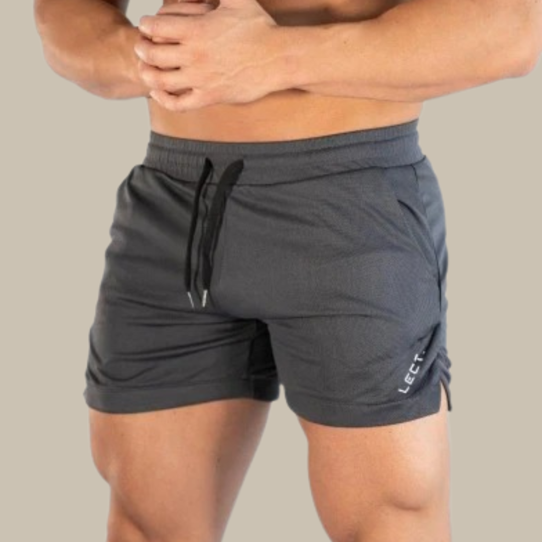 Sportieve heren zwembroek/shorts, perfecte mix van functionaliteit en stijl voor een actieve en trendy uitstraling. De strakke pasvorm en duurzame stof zorgen voor optimale prestaties, terwijl de veelzijdigheid geschikt is voor diverse gelegenheden. Must-have voor elke moderne man.