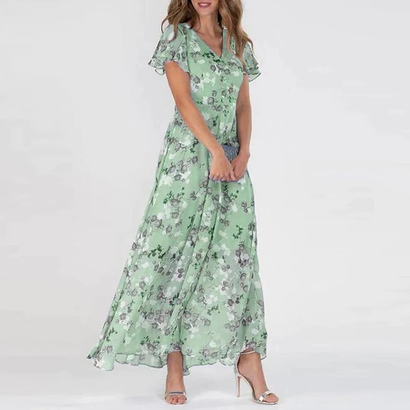 Lange zomerjurk met betoverende bloemenprint voor het ultieme zomergevoel. Deze jurk heeft een flatterende pasvorm en is gemaakt van hoogwaardige materialen voor ultiem comfort en kwaliteit.