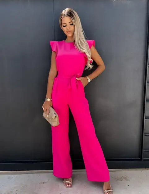 Deze jumpsuit combineert stijl, comfort en speelsheid met prachtige ruches mouwen en een ceintuur voor een flatterende en trendy uitstraling, geschikt voor diverse gelegenheden. Gemaakt van hoogwaardige materialen en veelzijdig inzetbaar voor zowel formele als informele events. Maattabel beschikbaar voor diverse EU-maten.