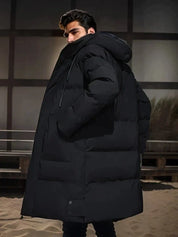 Filip | Lange herenjas met capuchon in de kleur Zwart voor heren in stijl ideaal voor de herfst.