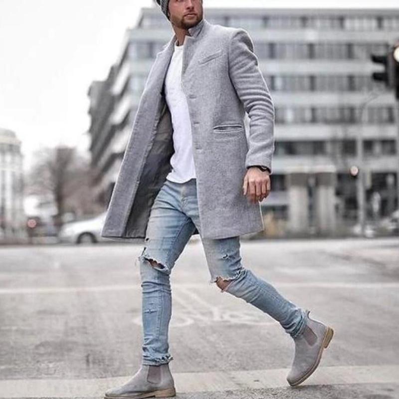 Stijlvolle en behaaglijk warme lange wollen herenjas, perfect voor een trendy najaarslook. De effen kleur maakt moeiteloze combinaties met diverse outfits mogelijk. Maattabel beschikbaar voor diverse maten.