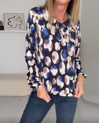 Bedrukte elegante blouse met bandjes